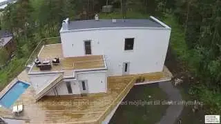 Hybrid Vision - Arkitektritat hus med havsutsikt