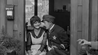 Between Showers (1914) Charlie Chaplin