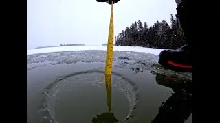 Checking the ice thickness on Wabigoon Lake