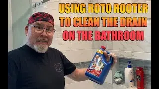Using roto rooter to clean the drain on the bathroom