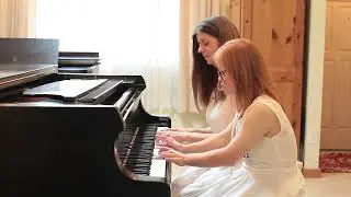 Girl with Down syndrome plays Twinkle Little Star Duet
