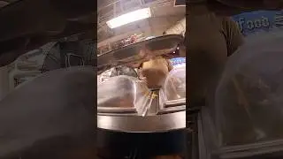 Eating steak and rice on a navy ship