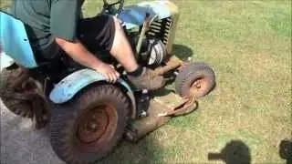 ANTIQUE PANZER MOWING GRASS
