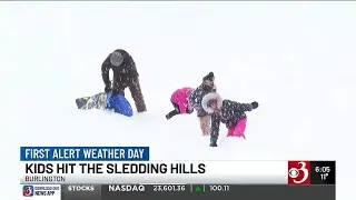 Kids hit the sledding hills on snow day