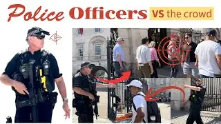 Police Officers on full alert,guarding the King&rsquo;s Guard