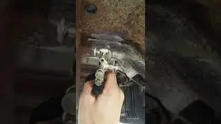 Spraying fluid film with a air assist sprayer.