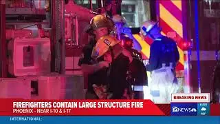 650 AM Phoenix firefighters contain large structure fire