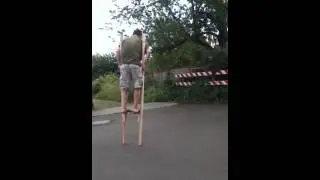 TJ on stilts