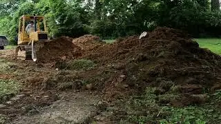 Filling in swimming pool with dirt