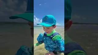 Sunshine and splashes, all smiles under our Hydro Hat! ☀️🧢 Keep your little one cool and protected