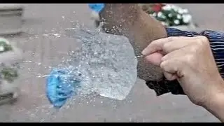 The Physics of Popping Water Balloons