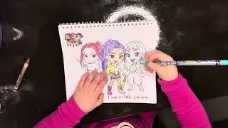 Coloring my huntrix book.  Watch me color Rumi, Zoey, and Mira.  It turned out beautiful 🤩 