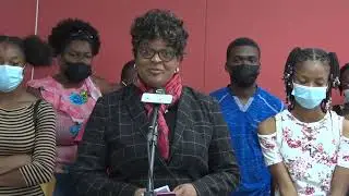 Report Seven Students get new laptops to pursue studies in Jamaica