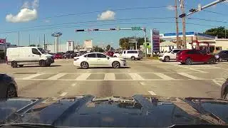 Driving in the city of Hialeah, Miami, on 49th Street from 9th Street W to the 826 South ramp.