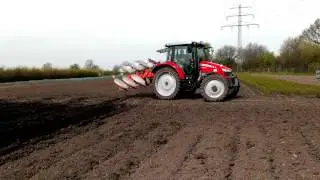 MF 5600 (5609) mit Kuhn 3 Schar Pflug