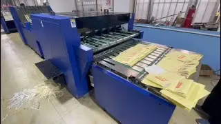 EXERCISE BOOKS&NOTE BOOKS FULL AUTOMATIC PRODUCTION LINE-COLLATING,STAPLING,FOLDING,WASTING,CUTTING.