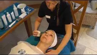 Giving an effective anti ageing facial with my hand held galvanic spa
