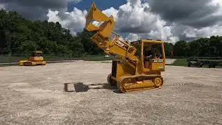 1996 John Deere 455G with 4 in 1 Bucket C&C Equipment