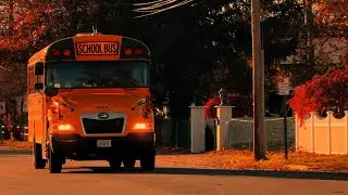 2025 Blue Bird Vision STS Bus Passing by the HS