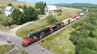 Awesome Aerial 4K View! Good Size Freight Train CN 594 West w/Containers passing thru Penobsquis, NB