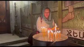 Dalia Lighting Candles at the Church of the Holy Sepulcher