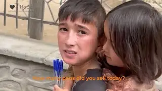 Update on girl selling pens on the streets #0001004