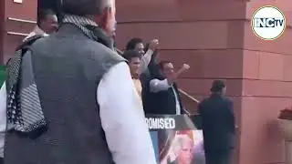Congress MPs protest on the Parliament steps with a clear message: &ldquo;PM is compromised.&rdquo;