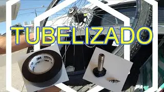 Tubelizar rueda mtb con cinta para cables aislante y pico de auto super fácil!!