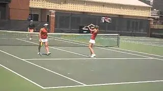 U of Arkansas doubles tennis match
