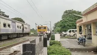 HIGH SPEED EMU LOCAL TRAIN PARALLEL CROSSING AT RAILGATE
