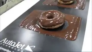 Spraying Chocolate on Doughnuts with AccuCoat&reg; Heated Spray System spray com
