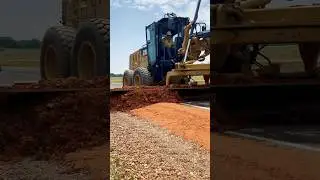 Watching that motor grader make art out of shoulder materials. #motorgrader #construction
