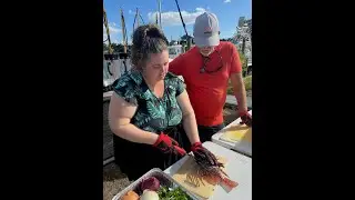 How to safely fillet a lionfish - Scuba Educators International instructor in training Anna Marie