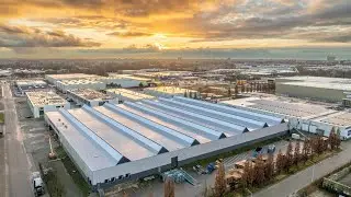 TPO Sureweld van Carlisle aangebracht, oude verzadigde isolatie en pvc gesloopt via Rockcycle.