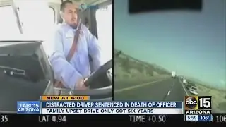 Distracted driver sentenced in death of officer