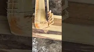 Carving stepped grooves into marked wood with chisel