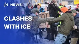 Minneapolis protesters face off with police outside federal building