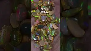 Dark base polished opal
