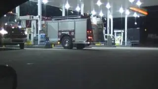2 Unmarked Fire trucks fueling up