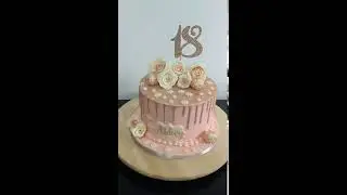 Rose gold drip cake with Edible flowers