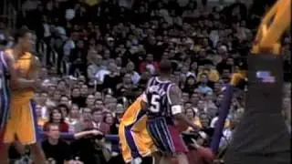 Kobe dunks YAO MING  ( over the top )