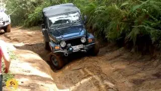 4x4 (4wd) Action - Jeep sliding in mud hole @ Glasshouse Mountain