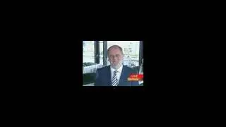 Corrigan Criticizes S&P's Analysis in Credit Downgrade