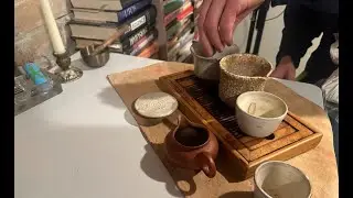 two writers drinking tea and writing
