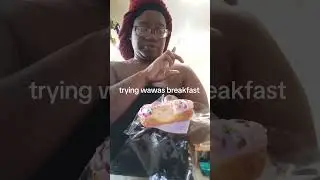 Trying Wawa breakfast breakfast sandwich  Two strawberry donuts 🍩