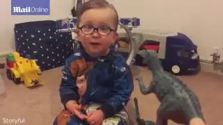 Adorable two year old boy names dinosaurs in cutest way possible