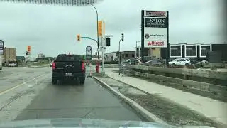 WINNIPEG MORNING DRIVE.  Buying food in drive thru Jollibee , Winnipeg, Manitoba , Canada