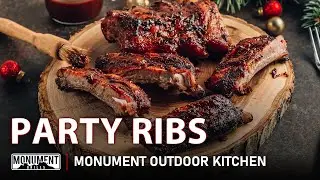 Enjoy party ribs while watching a live game l Monument Outdoor Kitchen