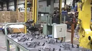 Transmission shaft vision-guided unload robot to automatic-guided vehicle (AGV)