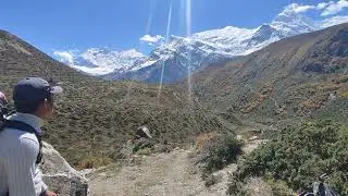 Annapurna Curcit - Day 08 -   Our guide explaining the white peaks